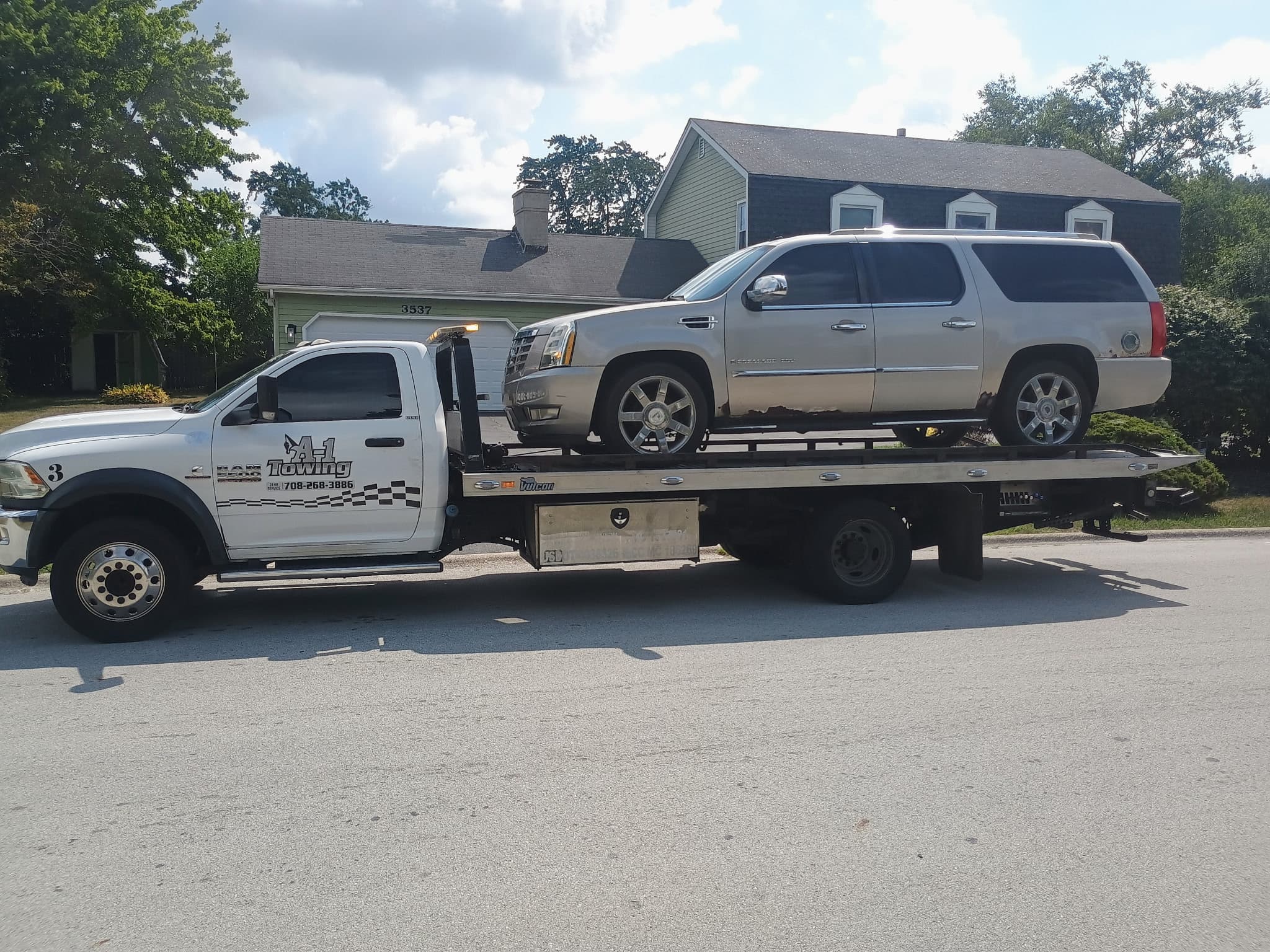 A-1 Towing flatbed with Cadillac Escalade in Chicago
